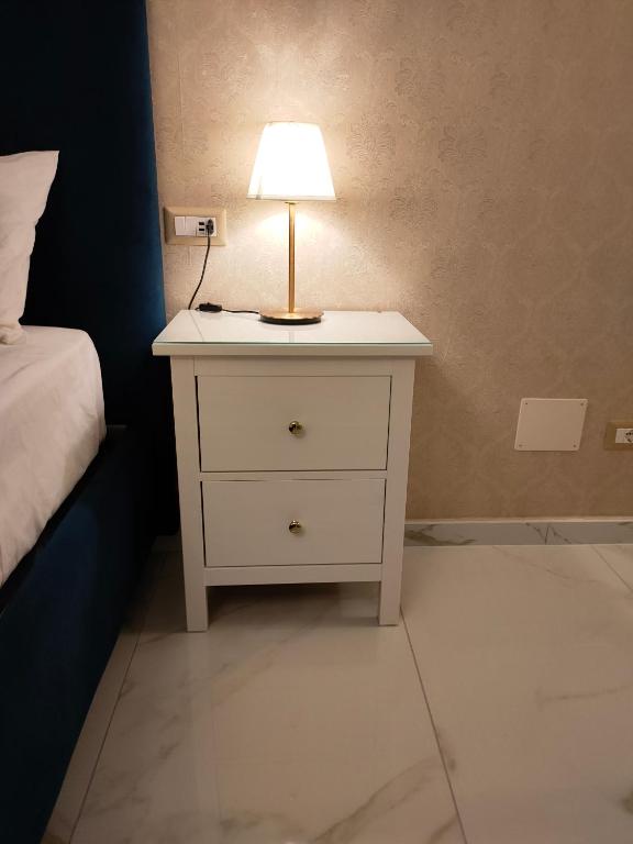 Postel nebo postele na pokoji v ubytování Napoli Sogno Infinito