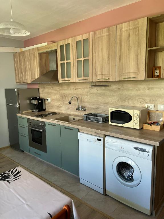 Kuchyň nebo kuchyňský kout v ubytování Apartment Mihaela