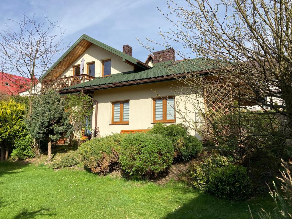 Vonkajšia záhrada v ubytovaní APARTAMENTY-STUDIO noclegi wczasy wakacje ferie - pobyty rodzinne