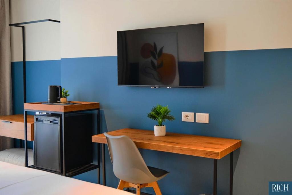 Kuchyň nebo kuchyňský kout v ubytování Rich Boutique Hotel