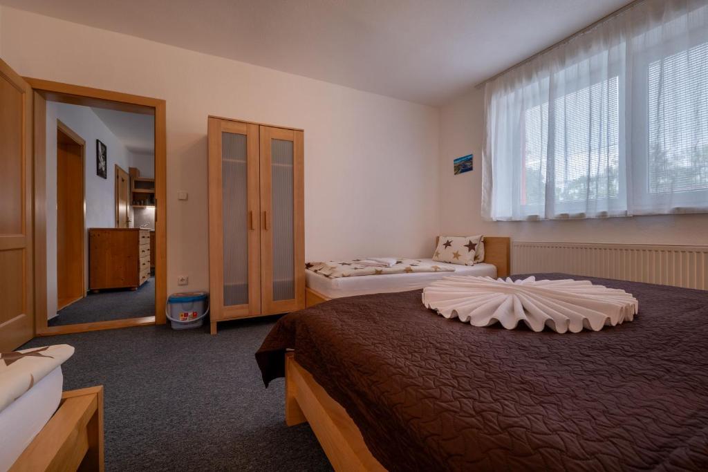Postel nebo postele na pokoji v ubytování Apartmány Dreams