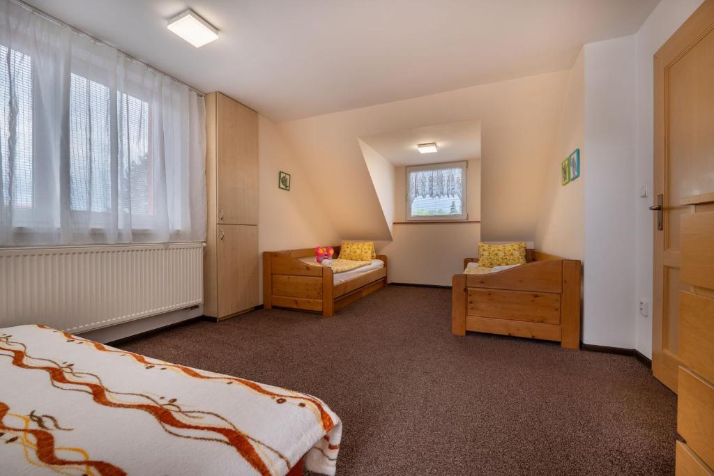Postel nebo postele na pokoji v ubytování Apartmány Dreams