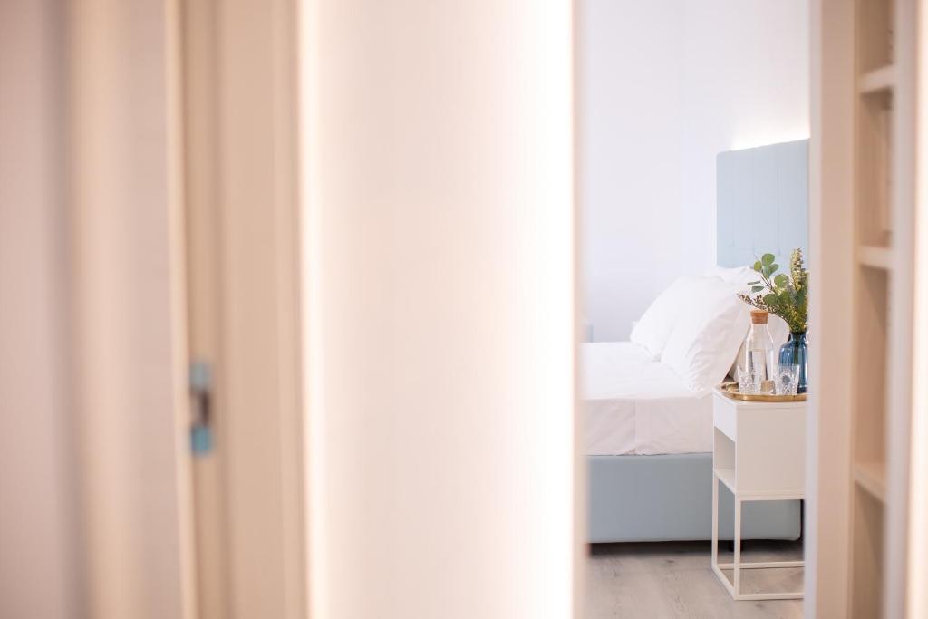Postel nebo postele na pokoji v ubytování A MARE Hotel
