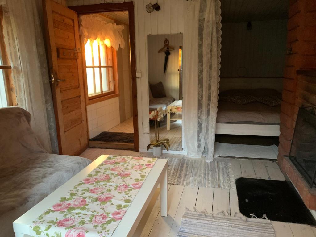 Un pat sau paturi într-o cameră la Nurme farm