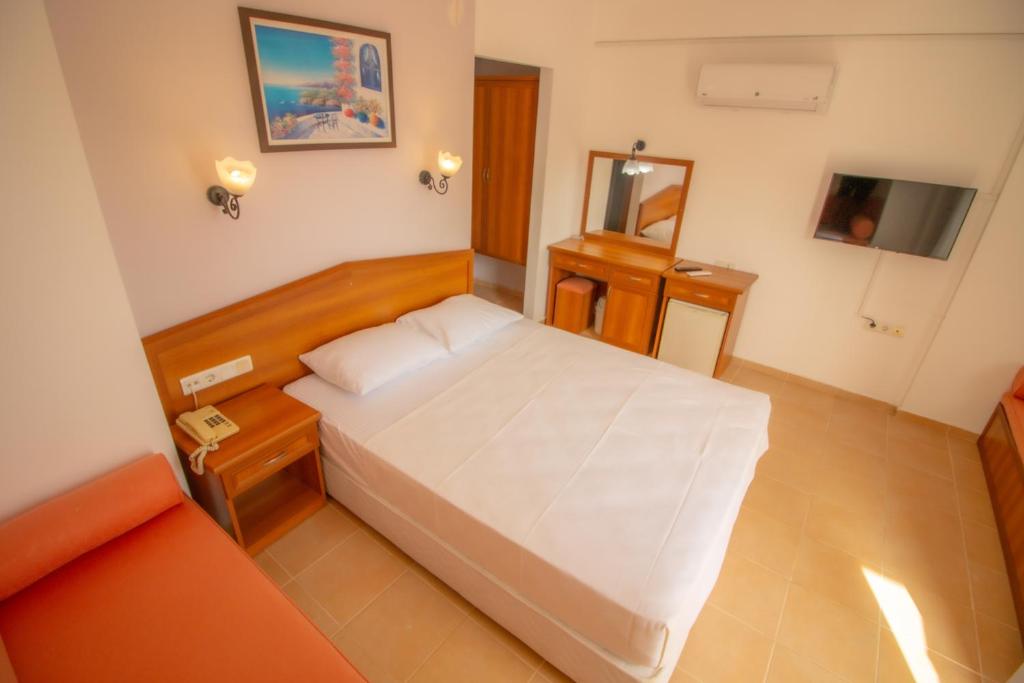 TV a/nebo společenská místnost v ubytování Celeste Hotel