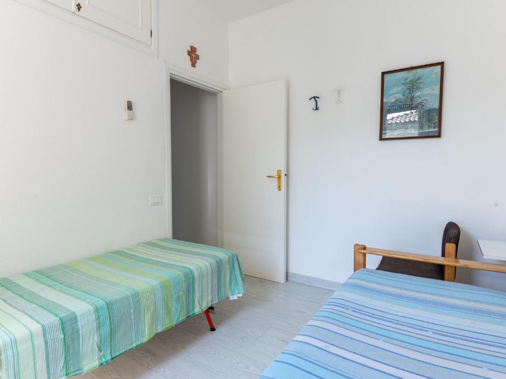 Postel nebo postele na pokoji v ubytování Holiday Home Casa Polipo by Interhome