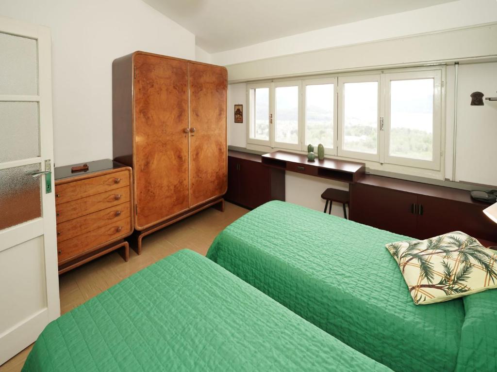 Postel nebo postele na pokoji v ubytování Apartment Colombaio by Interhome