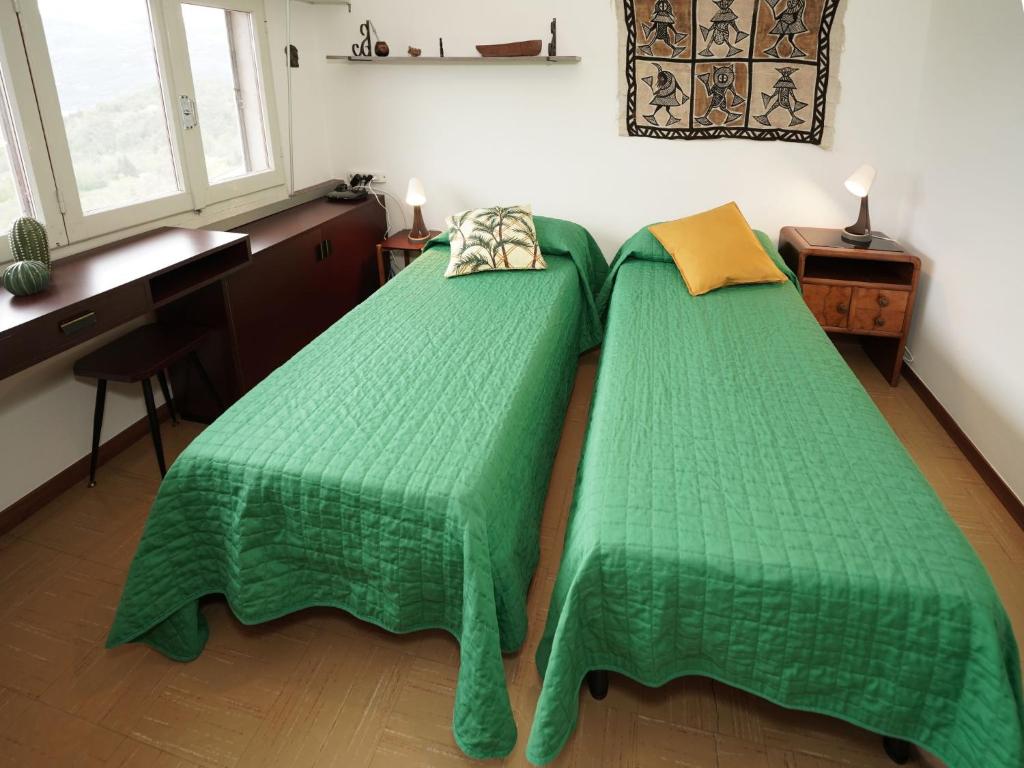Postel nebo postele na pokoji v ubytování Apartment Colombaio by Interhome