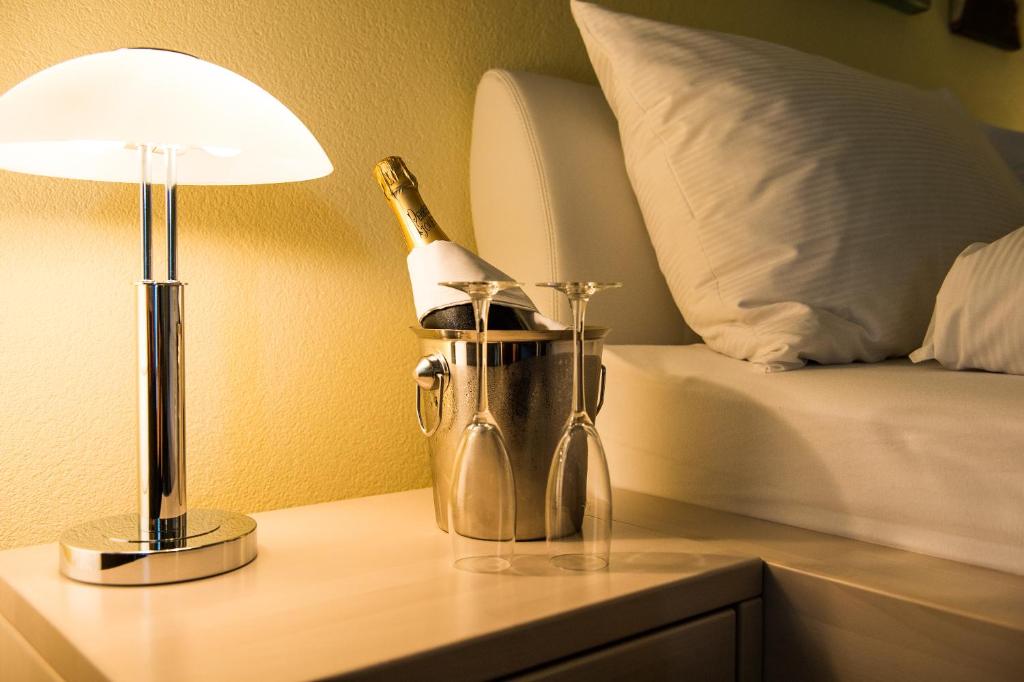 Postel nebo postele na pokoji v ubytování Hotel & Bildungszentrum Matt