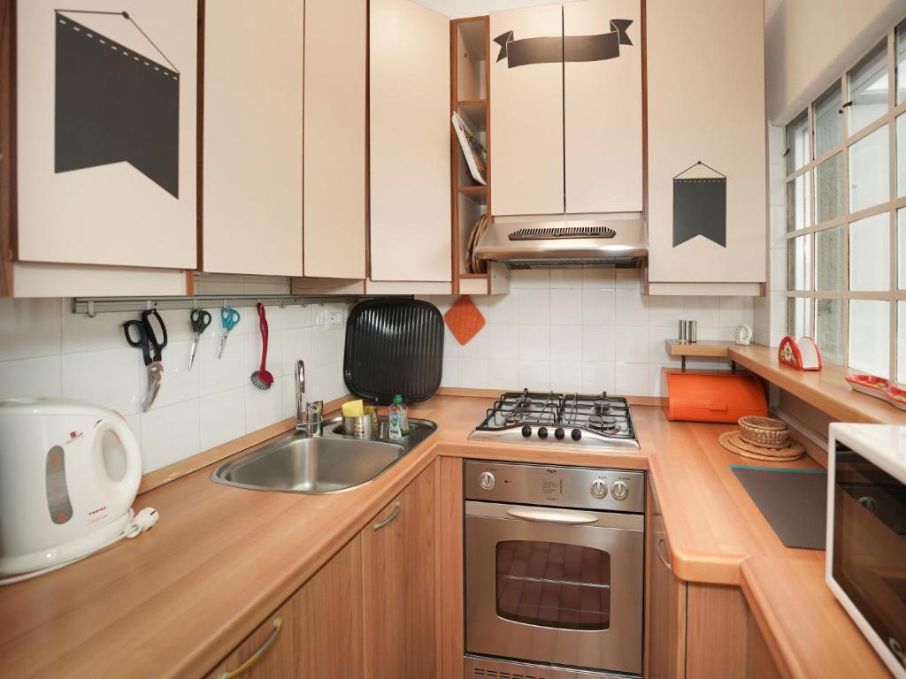 Kuchyň nebo kuchyňský kout v ubytování Apartment Colombaio by Interhome