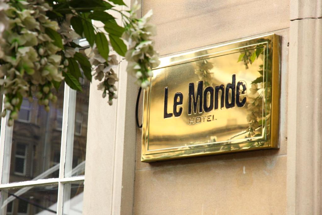 a sign on the side of a building at Le Monde Hotel in Edinburgh