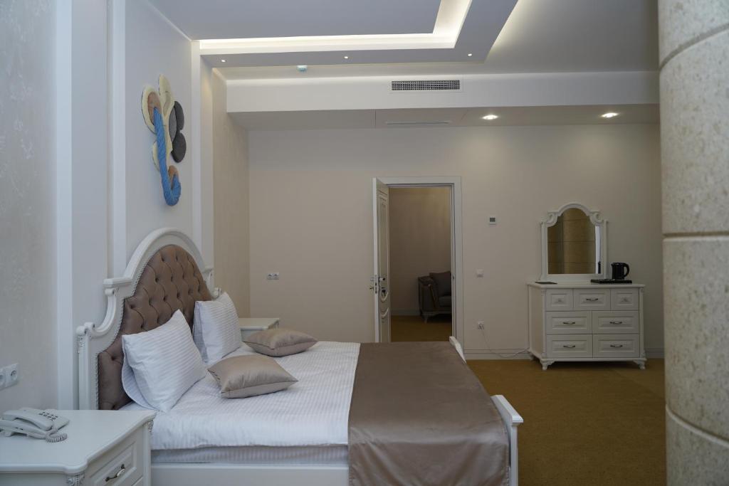 Postel nebo postele na pokoji v ubytování Igit Plaza Hotel
