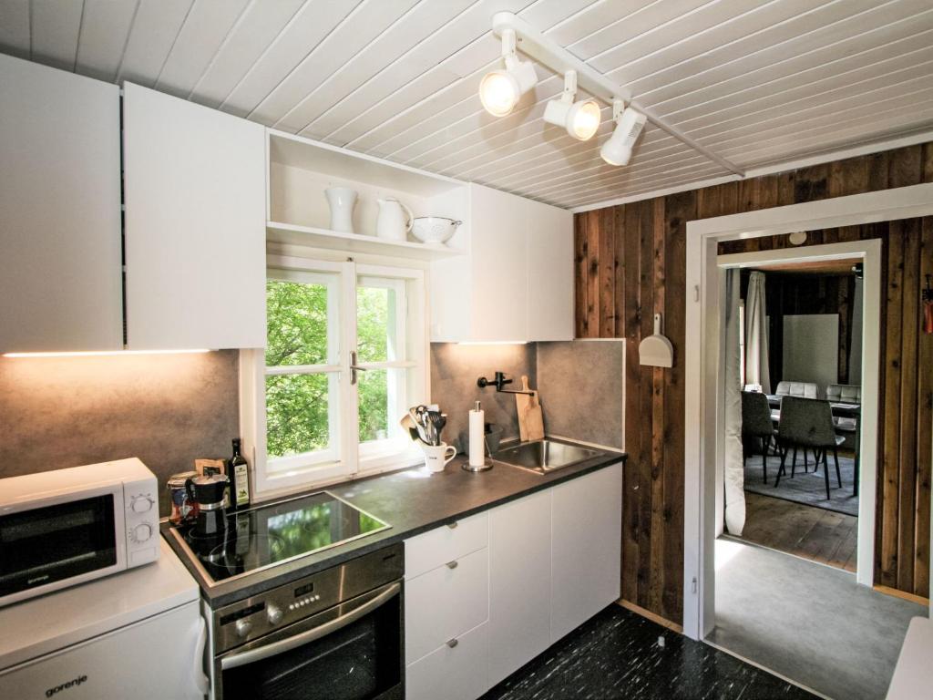 Kuchyň nebo kuchyňský kout v ubytování Holiday Home s`Hüttl reloaded by Interhome