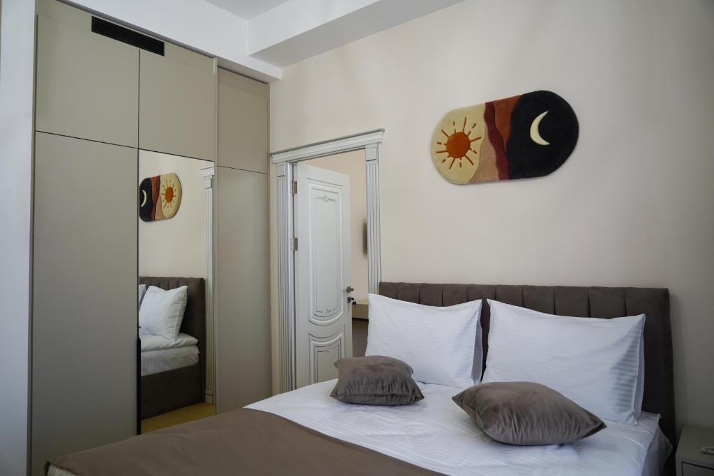 Postel nebo postele na pokoji v ubytování Igit Plaza Hotel