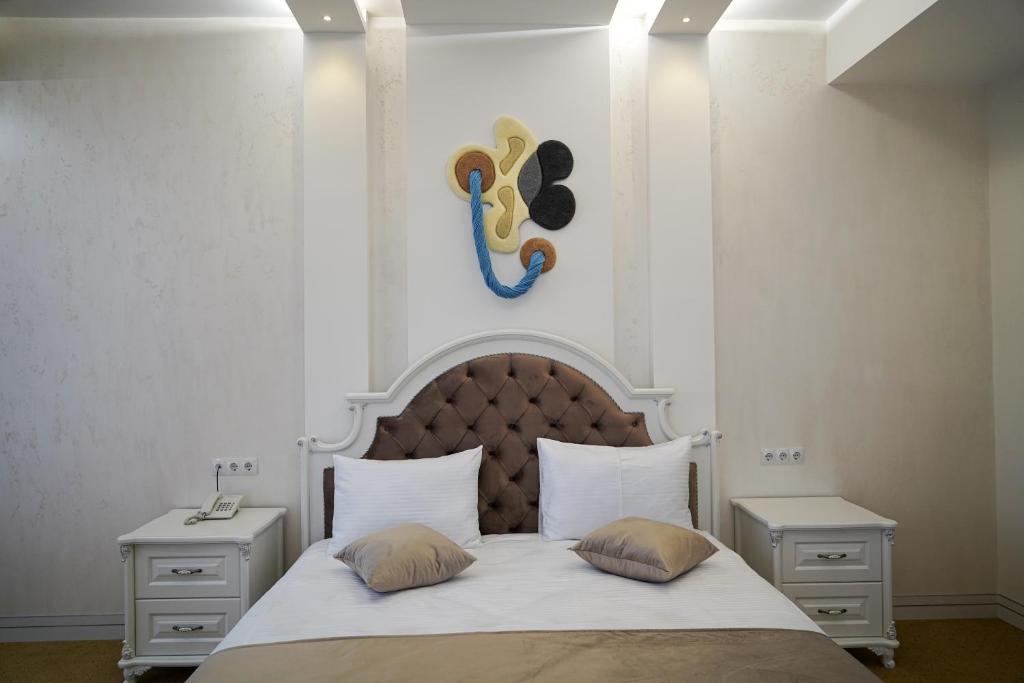 Postel nebo postele na pokoji v ubytování Igit Plaza Hotel