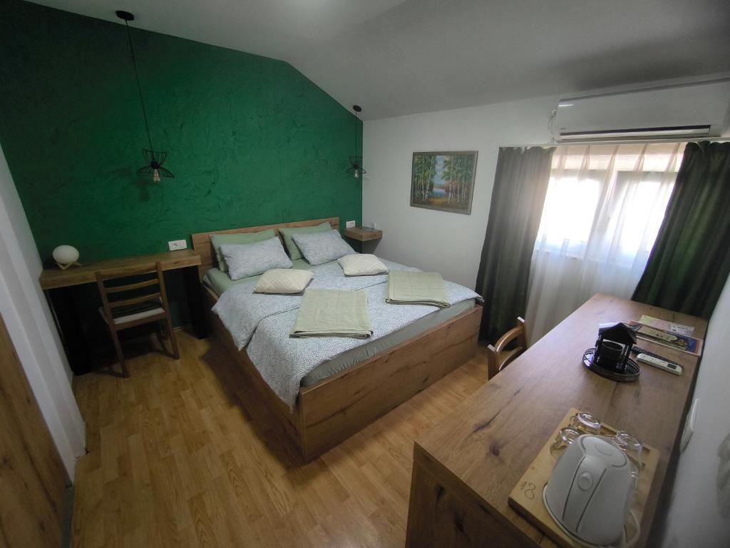 Postel nebo postele na pokoji v ubytování Pansion Infinity