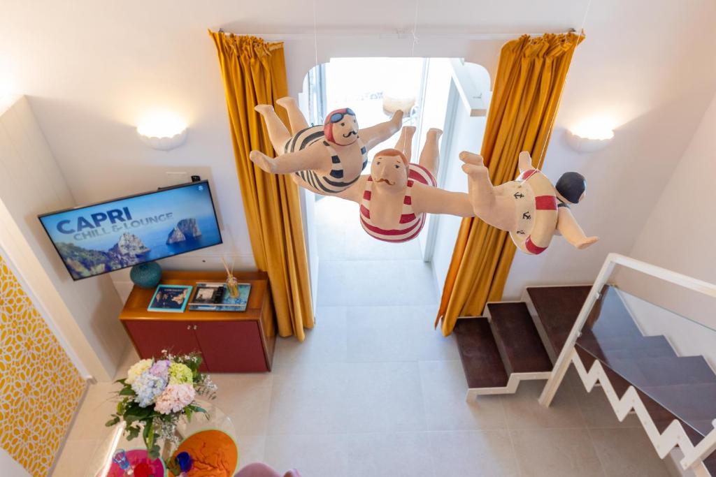 TV a/nebo společenská místnost v ubytování Suite Belvedere Capri Exclusive Rooms