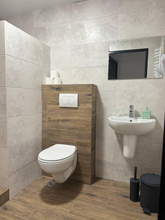 Koupelna v ubytování Aqua Hotel