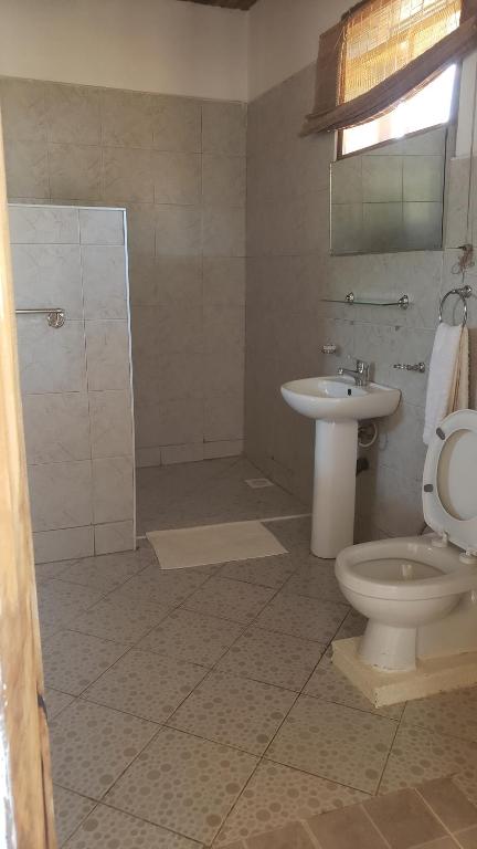 Secrets Guest House Entebbe - Deluxe Double Or Twin Room