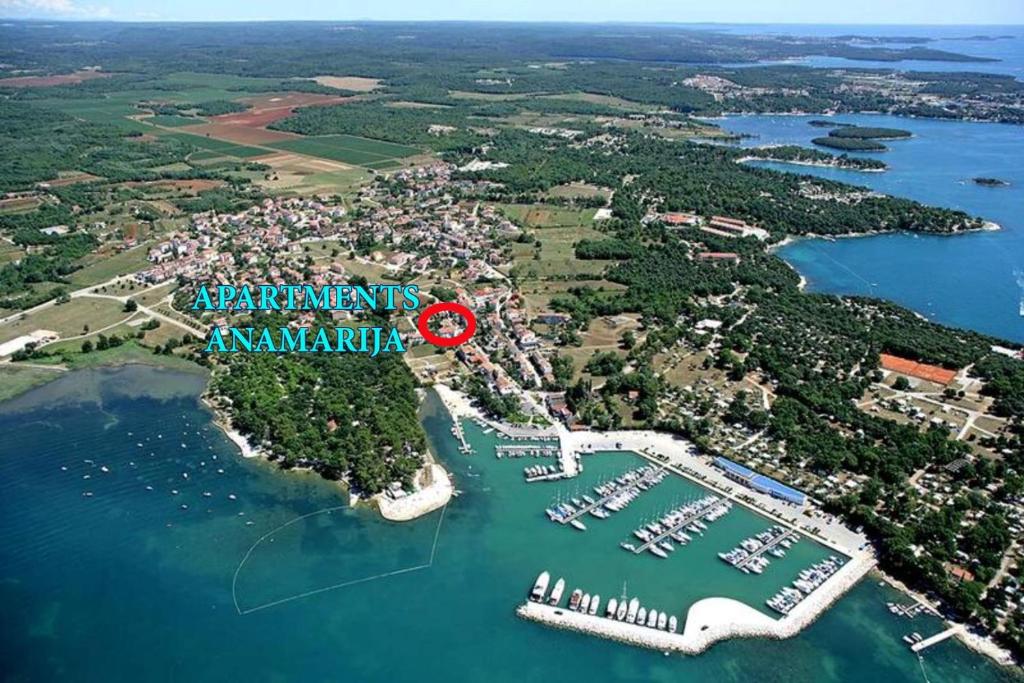 an aerial view of the marina at avalon island at Anamarija Apartments near the beach and the fantastic Adria Sea with over 10 small islands close by in Funtana
