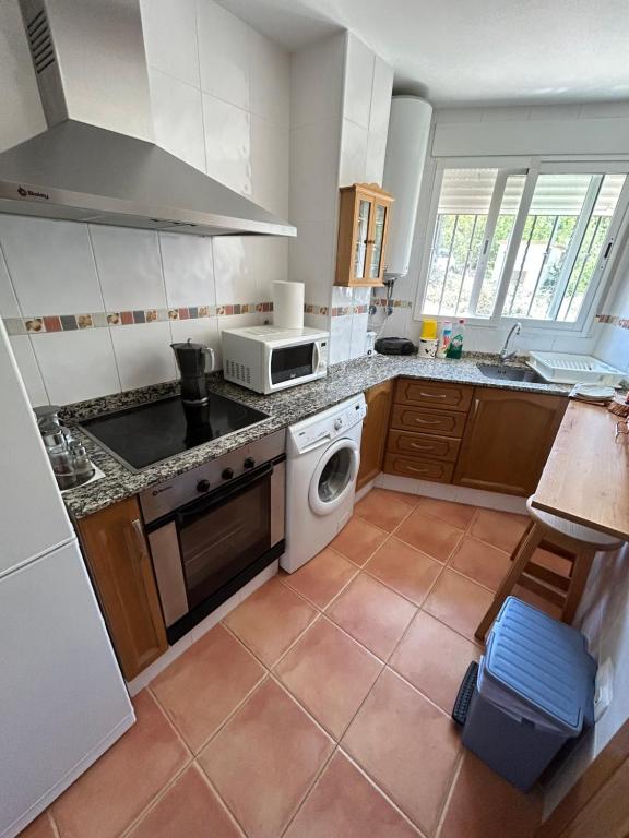 A kitchen or kitchenette at Apartamento Casa Rafa