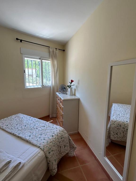 A bed or beds in a room at Apartamento Casa Rafa