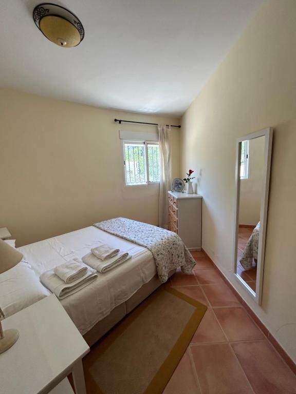 A bed or beds in a room at Apartamento Casa Rafa