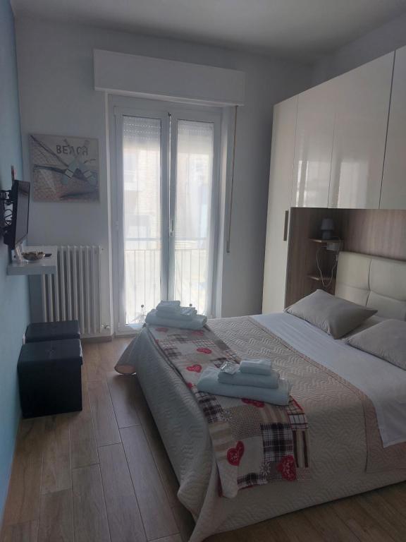 Postel nebo postele na pokoji v ubytování B&B Un posto al Sole