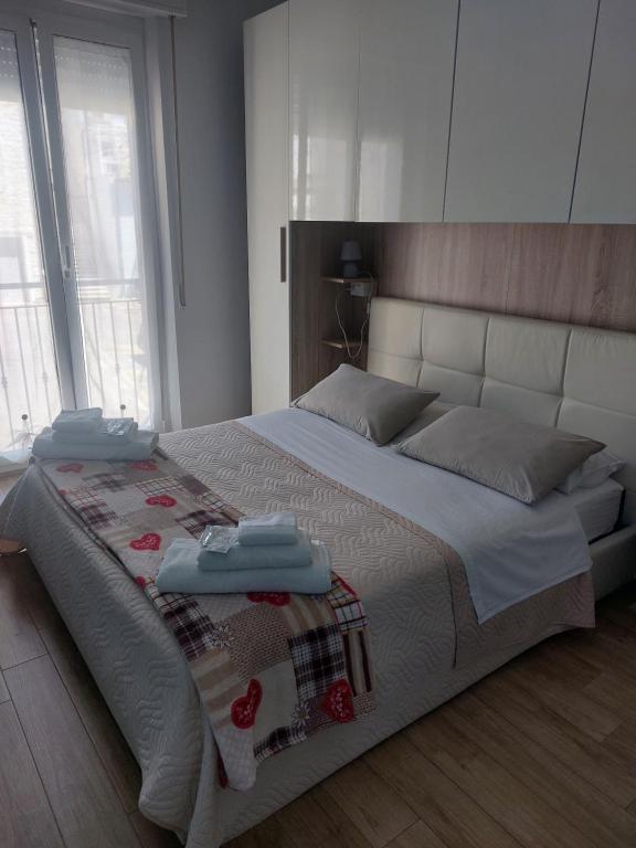 Postel nebo postele na pokoji v ubytování B&B Un posto al Sole