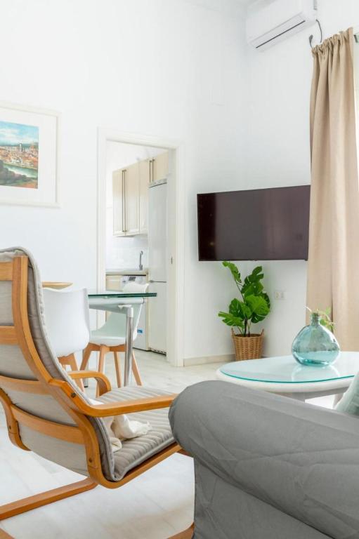 Televízia a/alebo spoločenská miestnosť v ubytovaní Apartamento Playa de Regla con terraza 1