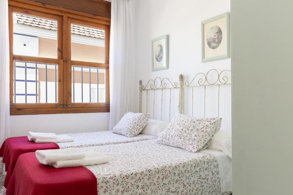 Posteľ alebo postele v izbe v ubytovaní Apartamento Playa de Regla con terraza 1