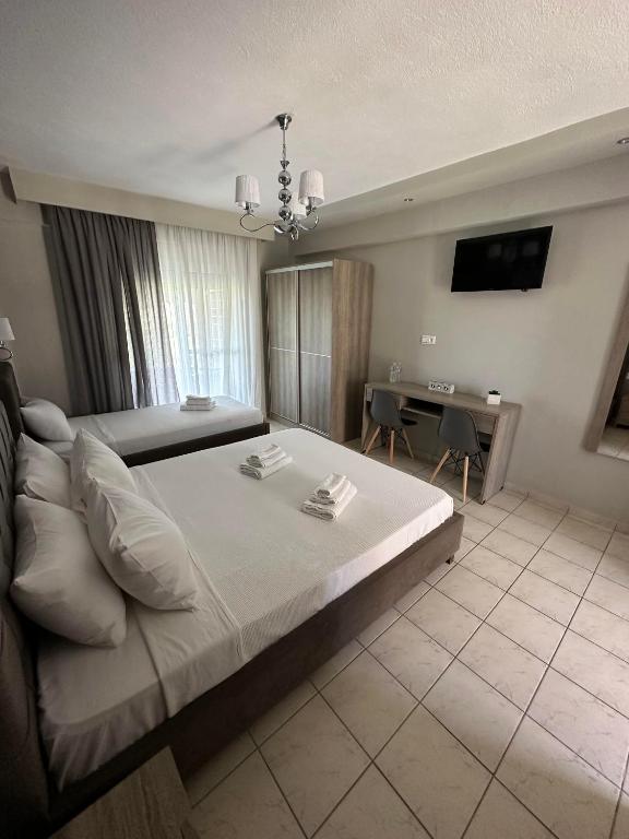 Postel nebo postele na pokoji v ubytování Mente Libre Villas