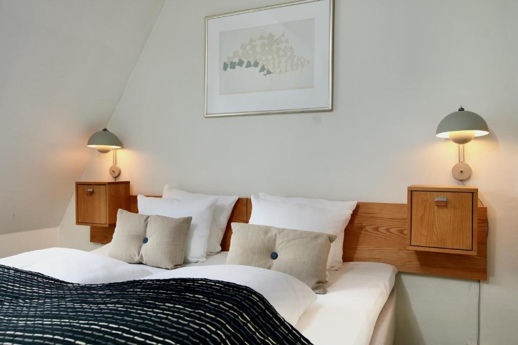 Postel nebo postele na pokoji v ubytování Hotel Alexandra