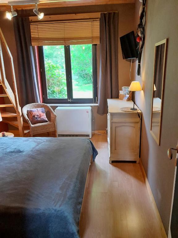 Postel nebo postele na pokoji v ubytování La Chrisnie