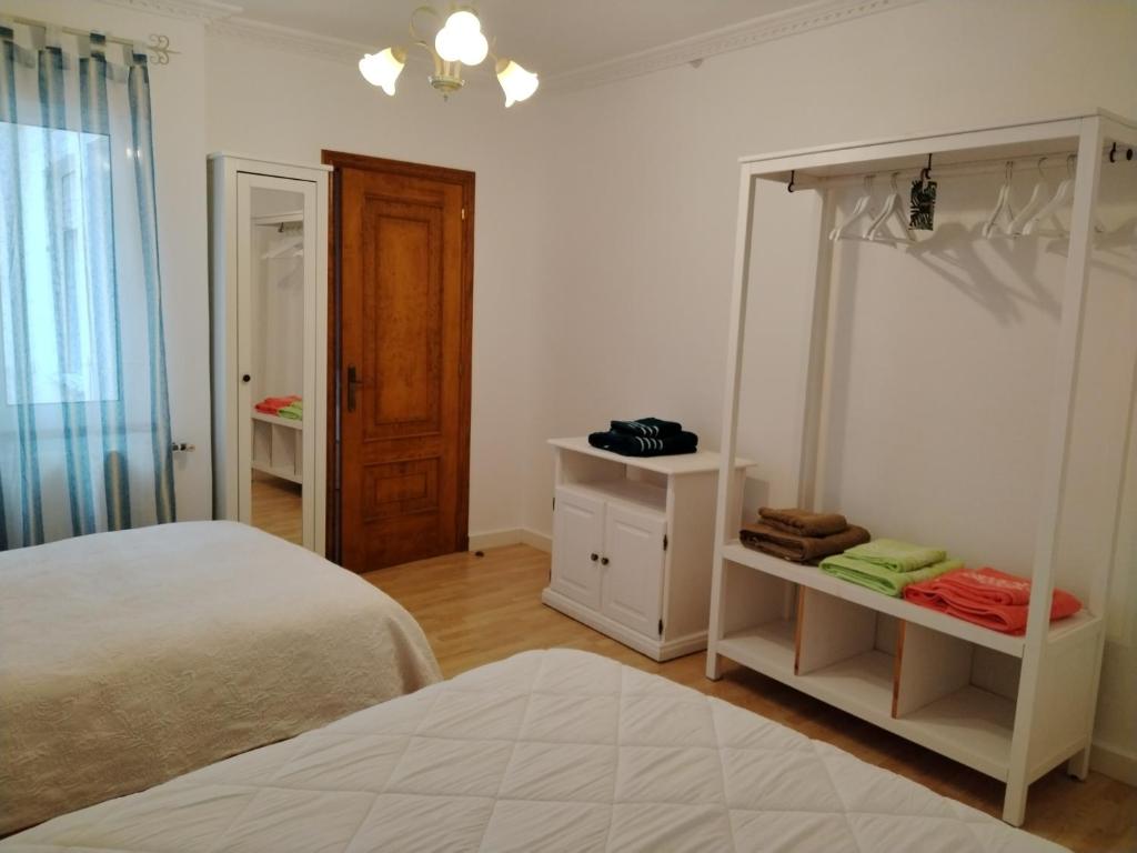 A bed or beds in a room at A Casiña De Abaixo