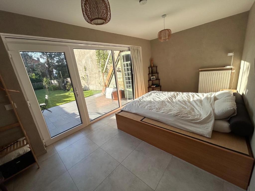 Postel nebo postele na pokoji v ubytování Ryokan met futon