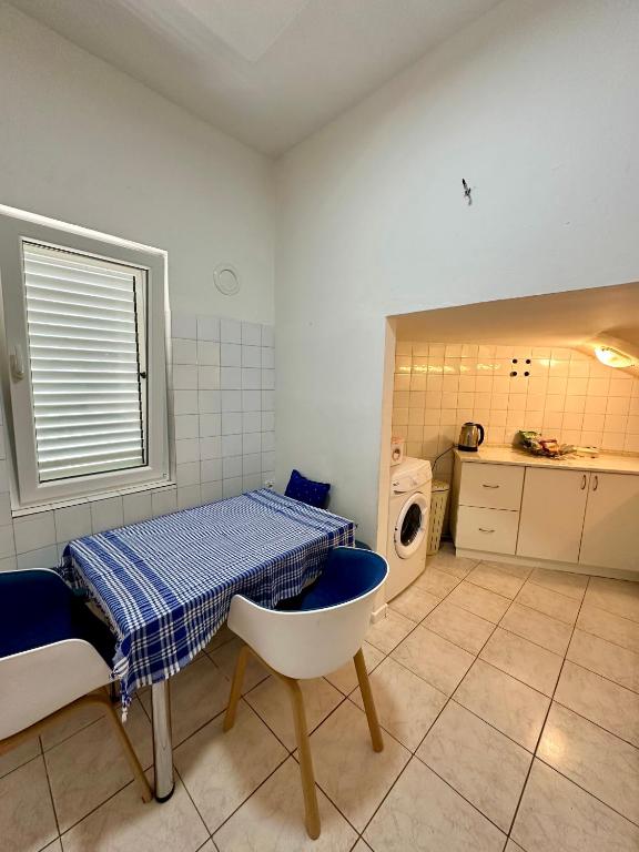 Kuchyň nebo kuchyňský kout v ubytování Villa Nela
