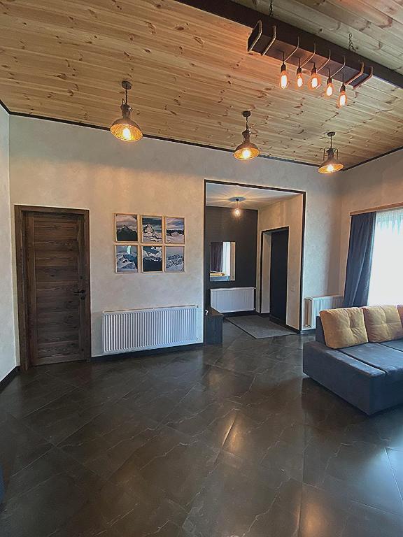 Posezení v ubytování TwinSide Chalet Bakuriani