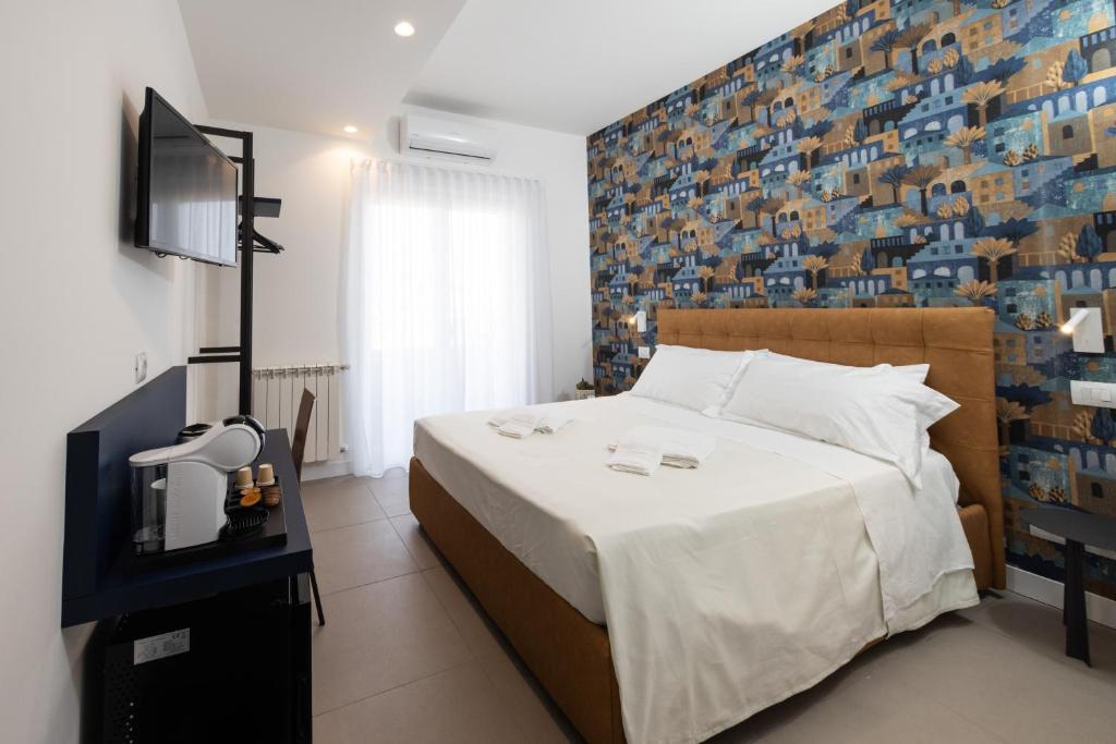 Postel nebo postele na pokoji v ubytování Sant’Agata Relais