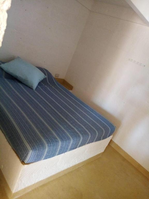 Postel nebo postele na pokoji v ubytování Masseria a libeccio