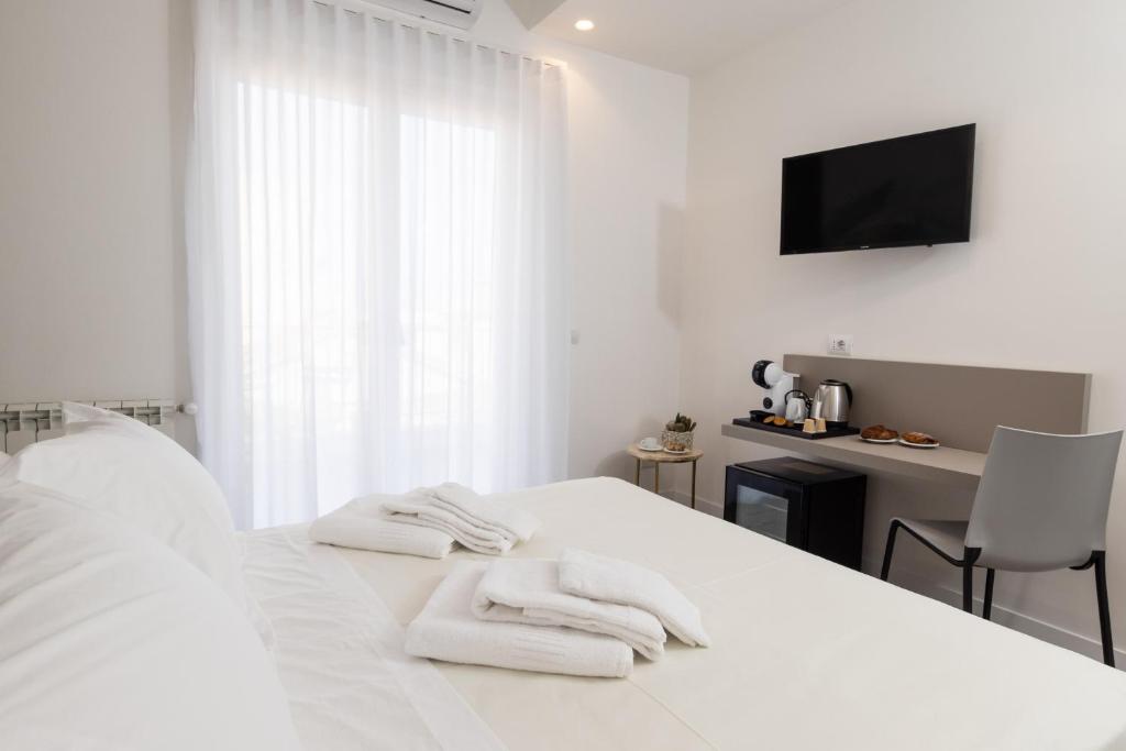 Postel nebo postele na pokoji v ubytování Sant’Agata Relais