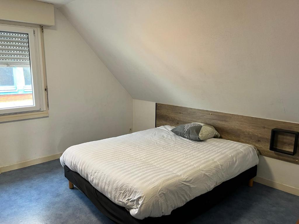 Postel nebo postele na pokoji v ubytování Camping De Collignon