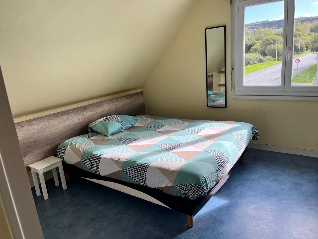 Postel nebo postele na pokoji v ubytování Camping De Collignon