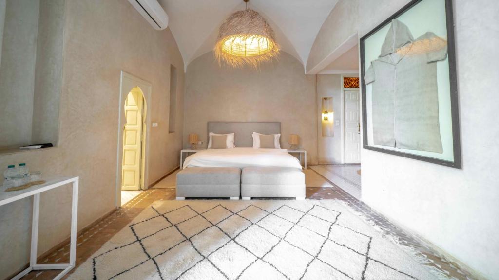 Postel nebo postele na pokoji v ubytování Riad Jawad & Spa