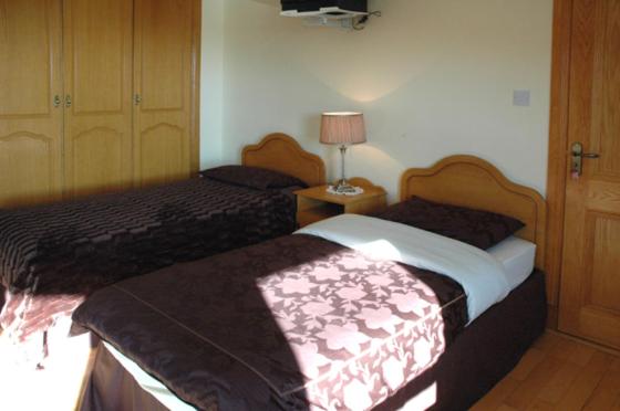 Postel nebo postele na pokoji v ubytování Caldra B&B