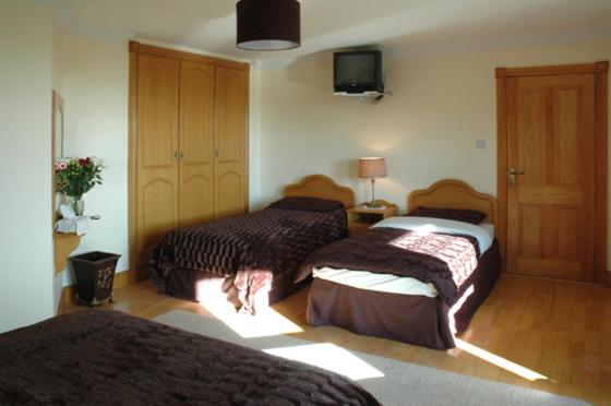Postel nebo postele na pokoji v ubytování Caldra B&B