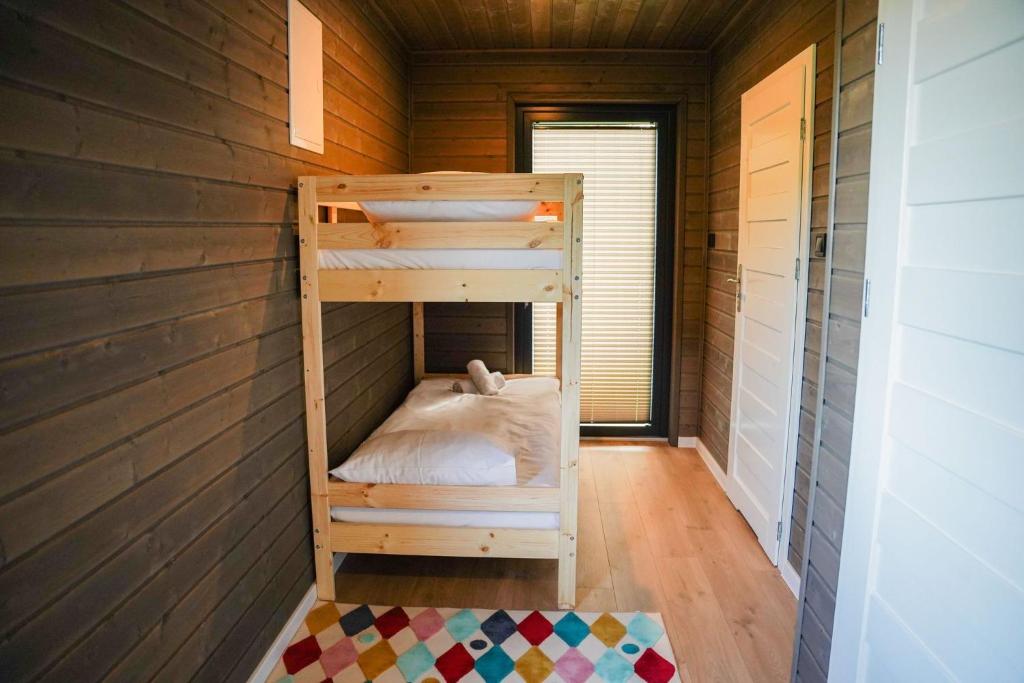 Postel nebo postele na pokoji v ubytování Ruciane Park - Mazury resort & spa