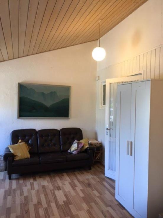 Posezení v ubytování Motel Villa Søndervang 3 personers værelse