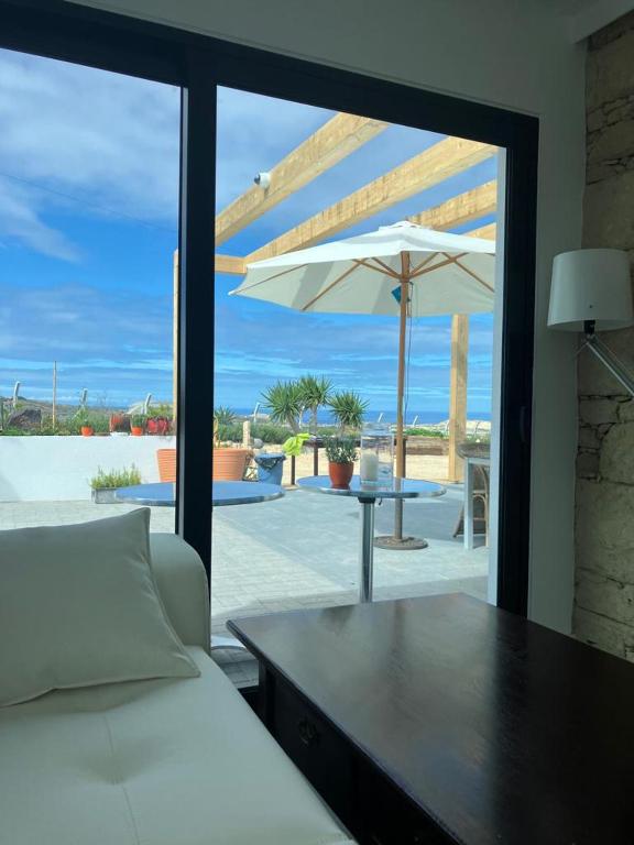 Postel nebo postele na pokoji v ubytování B&B Camacha Porto Santo
