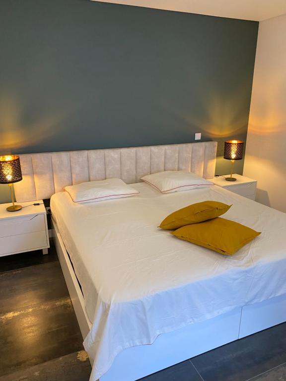 Postel nebo postele na pokoji v ubytování B&B Camacha Porto Santo